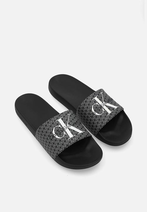 Calvin Klein - Slide AOP - Black