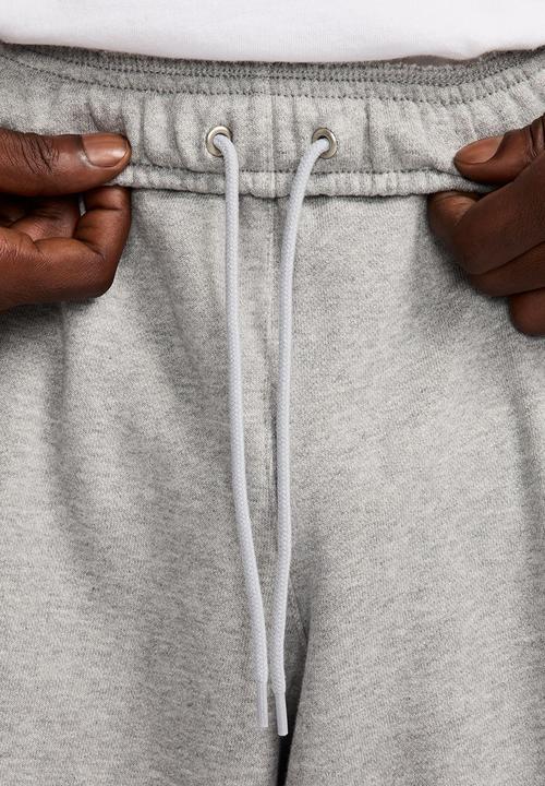Nike -  Club Fleece  Oversized French Terry Trousers   - dk grey heather/lt 