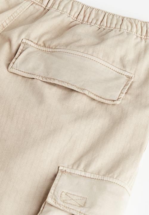 H&M - Loose fit cargo trousers - beige