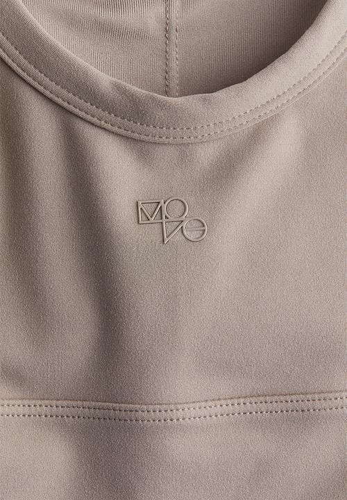 H&M - Softmove™ medium support sports bra - beige,grey