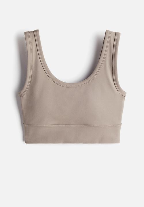 H&M - Softmove™ medium support sports bra - beige,grey