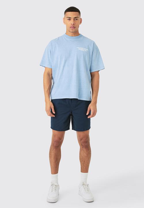 boohooMAN - Shorter Length Relaxed Fit Elasticated Waist Chino Shorts In Navy - Navy