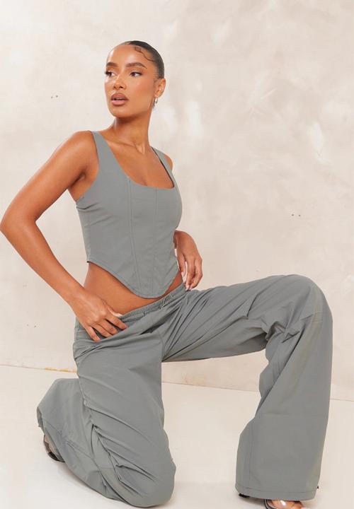 PrettyLittleThing - Shell Woven Dipped Hem Corset - Dark Khaki
