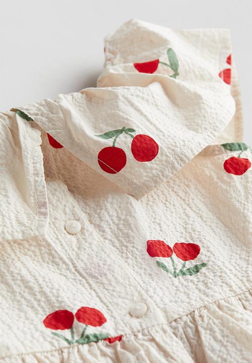 H&M - Patterned flounce-trimmed dress - cream cherries