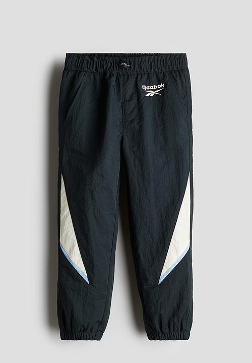 H&M - Reebok X H&M : Embroidered-detail nylon joggers - black
