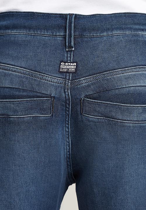 G-STAR - Denim trainer - worn in cloudy sky