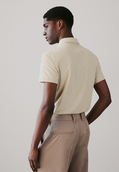 H&M - Slim fit polo shirt - light beige