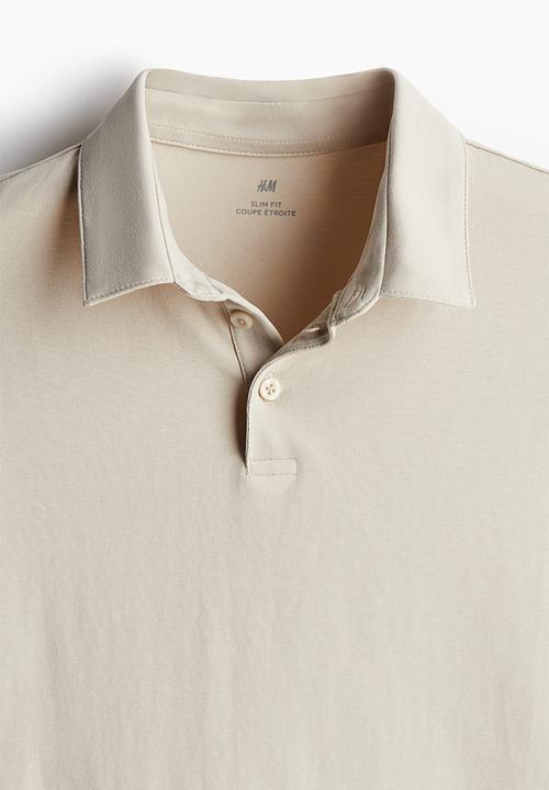 H&M - Slim fit polo shirt - light beige