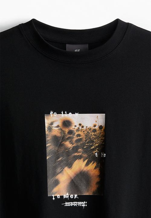 H&M - Loose fit printed T-shirt - black/sunflowers