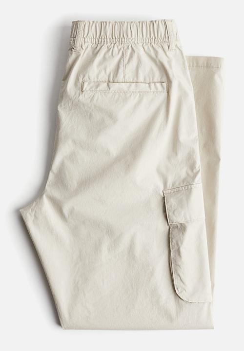 H&M - Regular fit cargo trousers - cream