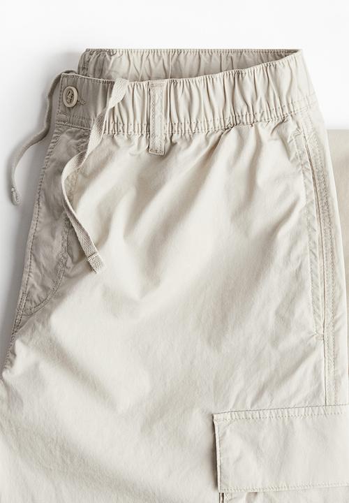 H&M - Regular fit cargo trousers - cream