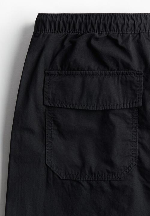 H&M - Loose fit parachute trousers - black