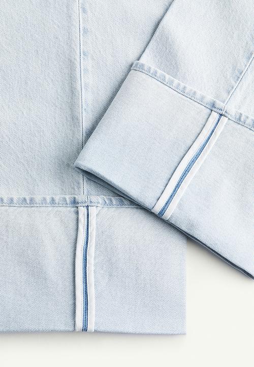 H&M - Straight high fold-up jeans - light denim blue