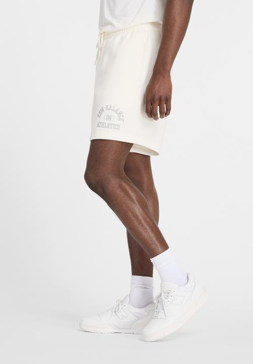 New Balance  - New Balance Varsity 7in Short - Sea Salt