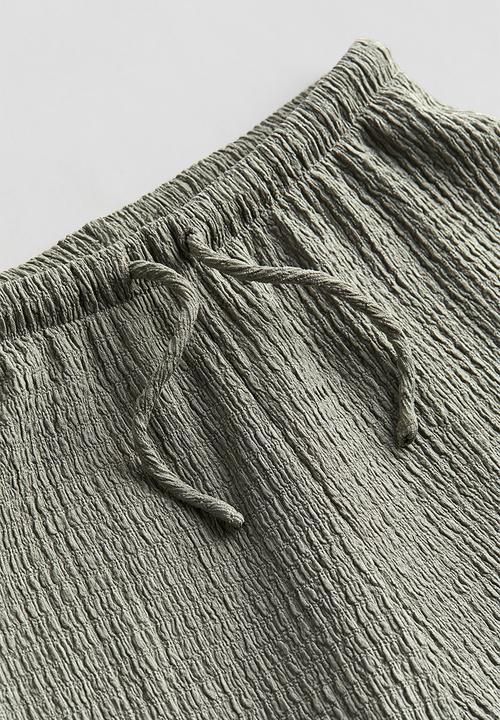 H&M - Crinkled jersey trousers - green
