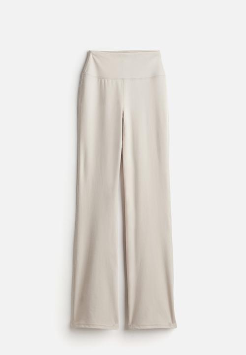 H&M - Drymove™ flared sports leggings - beige