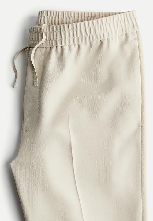 H&M - Slim fit tailored joggers - beige