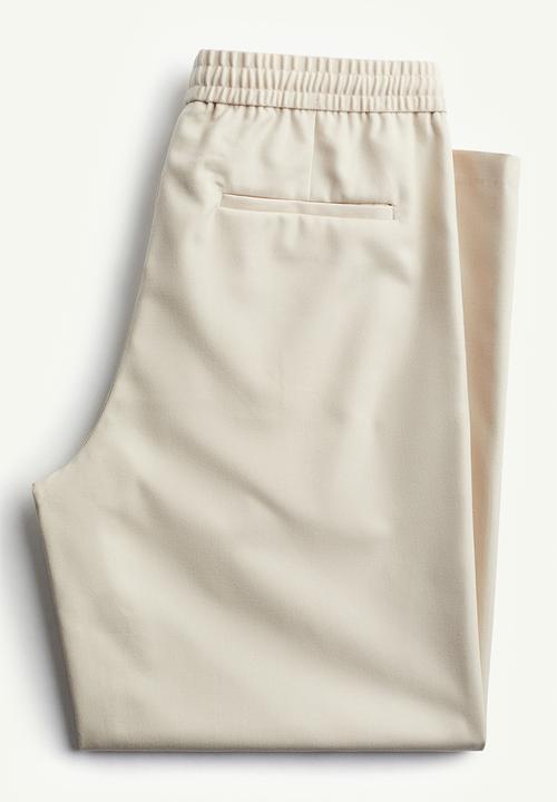 H&M - Loose fit twill joggers - beige
