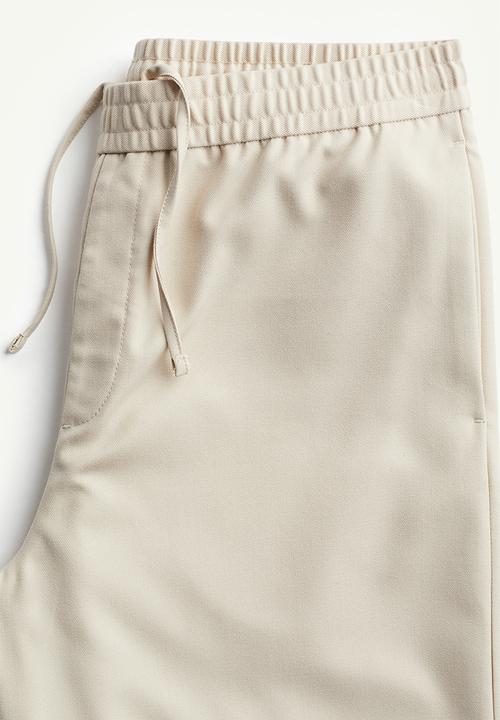 H&M - Loose fit twill joggers - beige