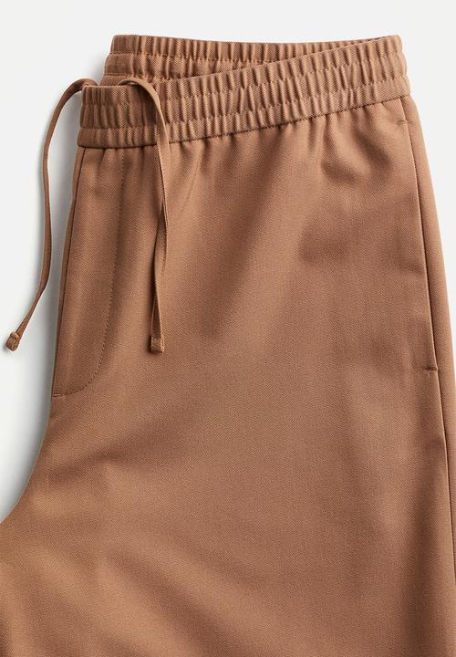 H&M - Loose fit twill joggers - light brown