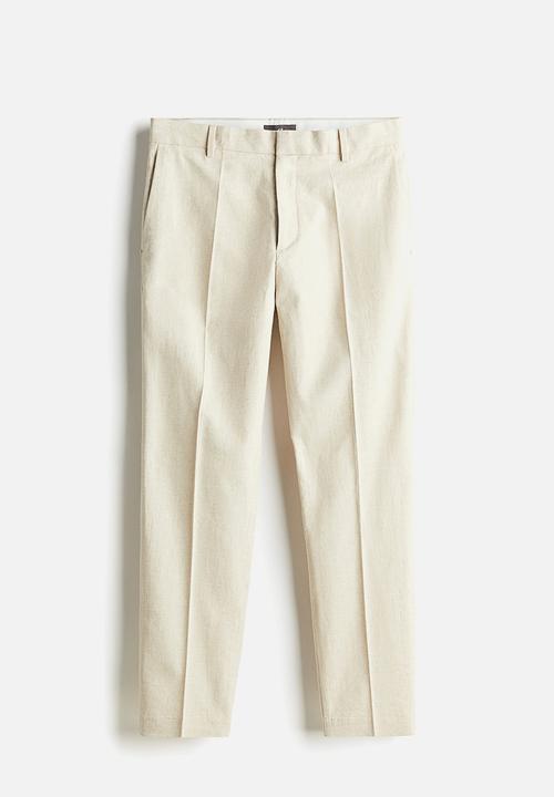 H&M - Slim fit tailored linen-blend trousers - beige