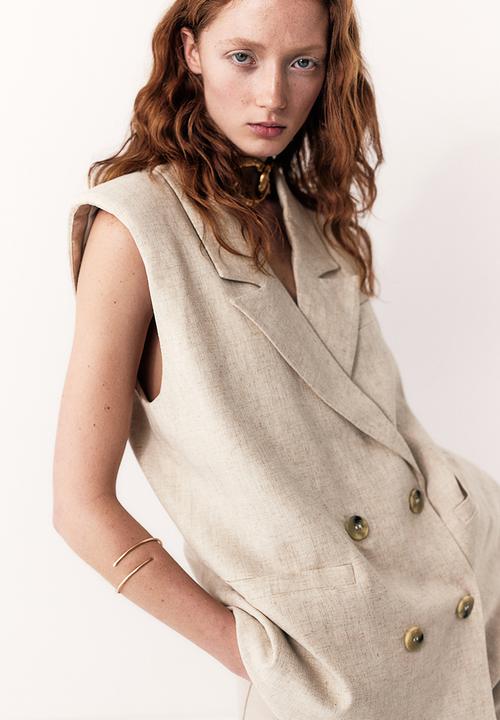 H&M - Sleeveless blazer - light beige 