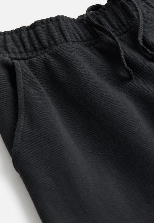 H&M - Straight sweatpants - black