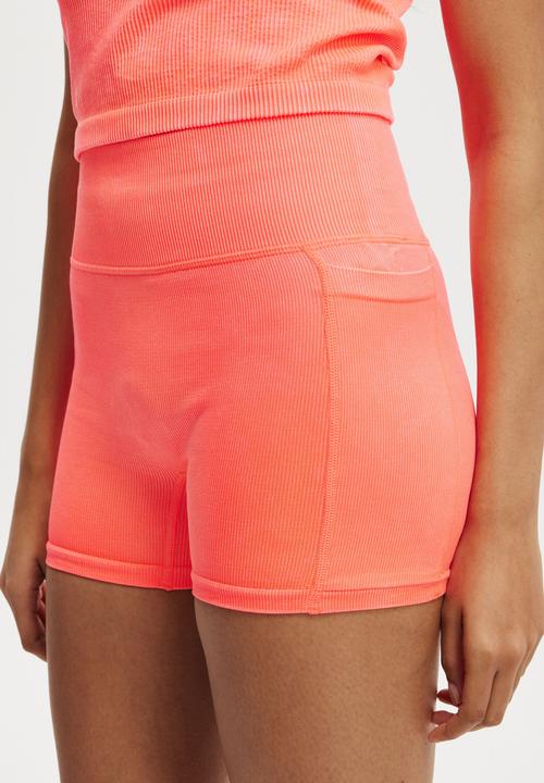 Cotton On - Seamless Pocket Shortie Short-Washed Vibrant Orange