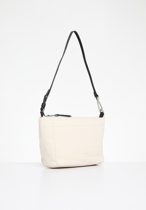 Calvin Klein - Summer story convertible pouch- dk ecru