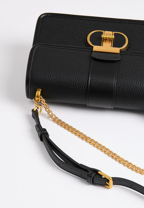 Jo Borkett - Monogram flapover sling - black