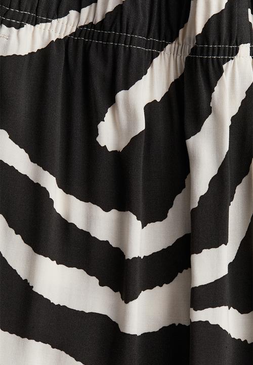 H&M - Cropped pull-on trousers - dark grey zebra print