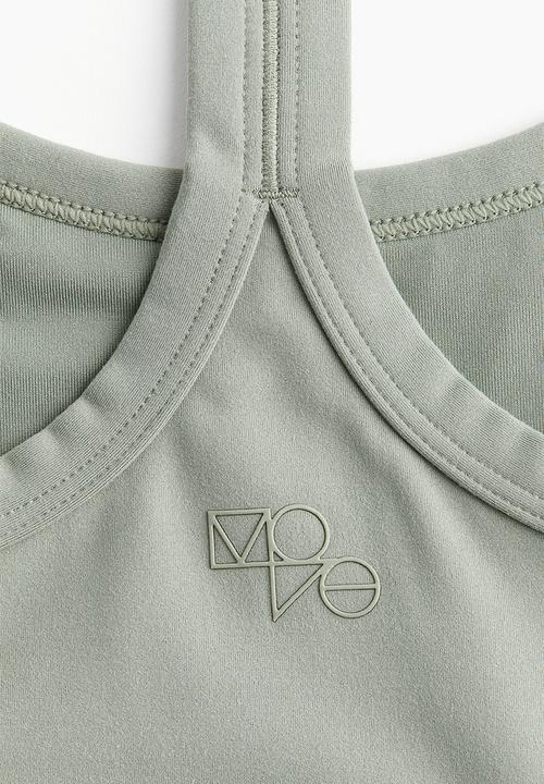 H&M - Drymove™ medium support sports bra - green
