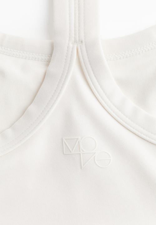 H&M - Drymove™ medium support sports bra - white