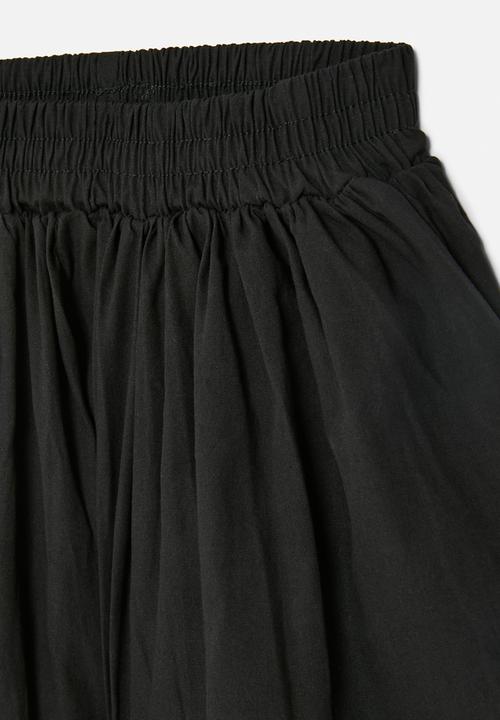Pop Candy - Flared shorts - black