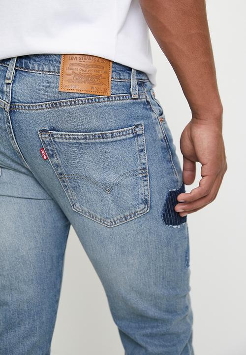 Levi’s® - 502™ Taper all in one patched - blue