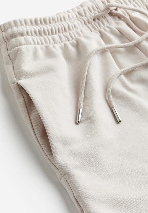 H&M - Sweatshirt shorts - light beige