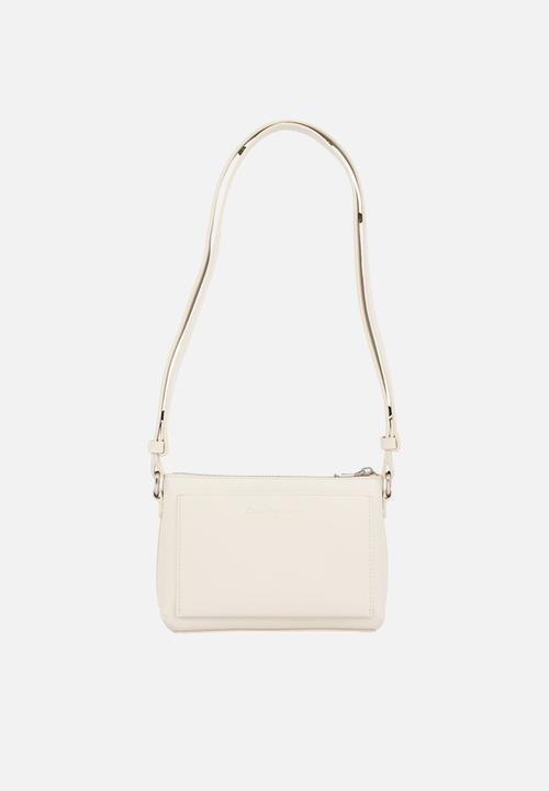 Calvin Klein - Scuplted camera pouch bag-eggshell