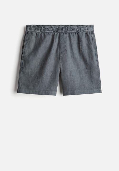 H&M - Regular fit linen shorts - dark turquoise
