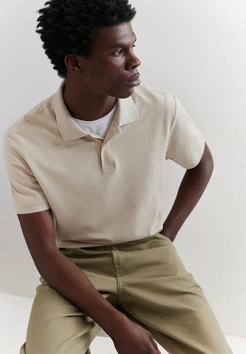 H&M - Regular fit piqué polo shirt - beige