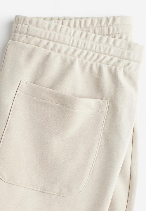 H&M - Regular fit sweatshorts - light beige