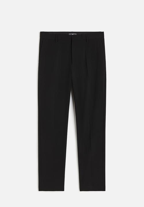 H&M - Slim fit trousers - black