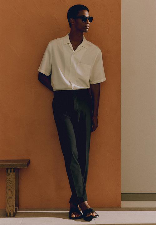 H&M - Slim fit trousers - black