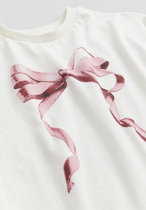 H&M - Oversized printed T-shirt - cream bow