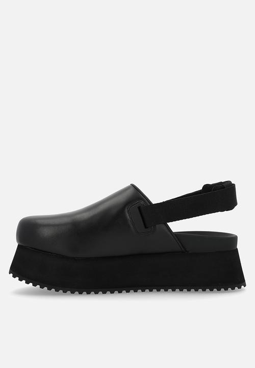Calvin Klein - Sling leather flatform - triple black