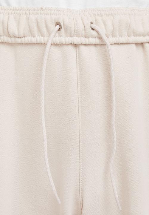 Nike - Nike Club Oversized French Terry Trouser - Lt Orewood Brn
