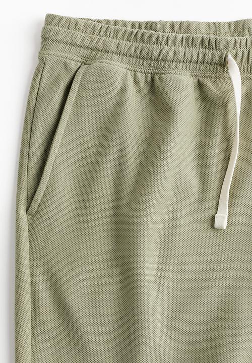 H&M - Regular fit piqué shorts - green