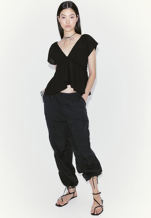 H&M - Crêpe peplum blouse - black