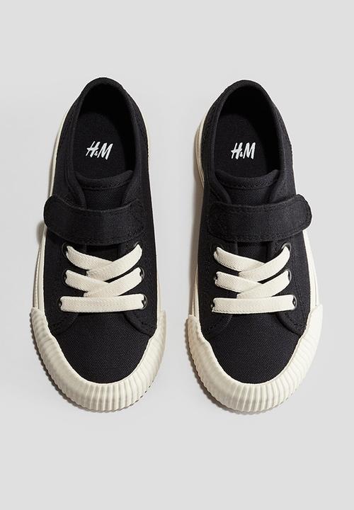 H&M - Keith Haring X H&M:  Cotton canvas trainers - black