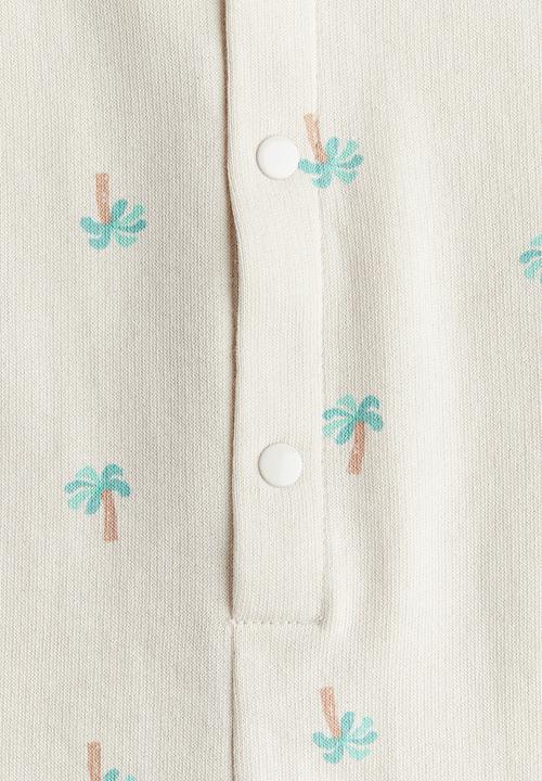 H&M - Sleeveless romper suit - light beige palm trees