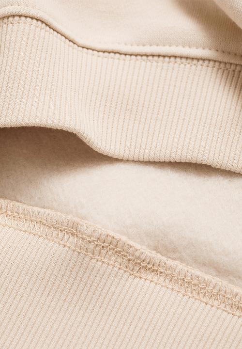 MANGO - Sweatshirt flow - light pastel brown